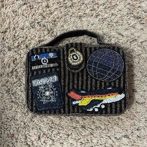 Viral ‘Made in India’ Beaded Travel-Themed Clutch with silver chain